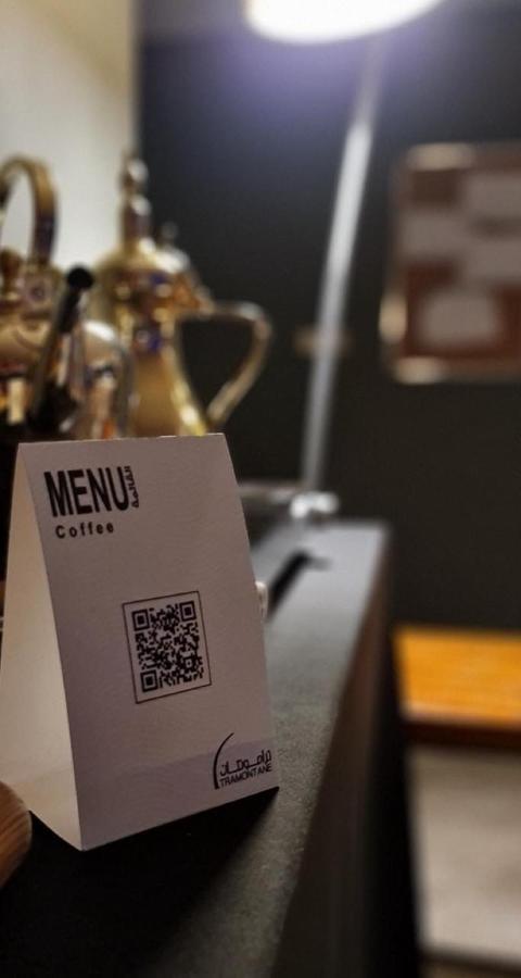 Aparthotel Taramuntan Ha'il Exterior foto QR code on a menu