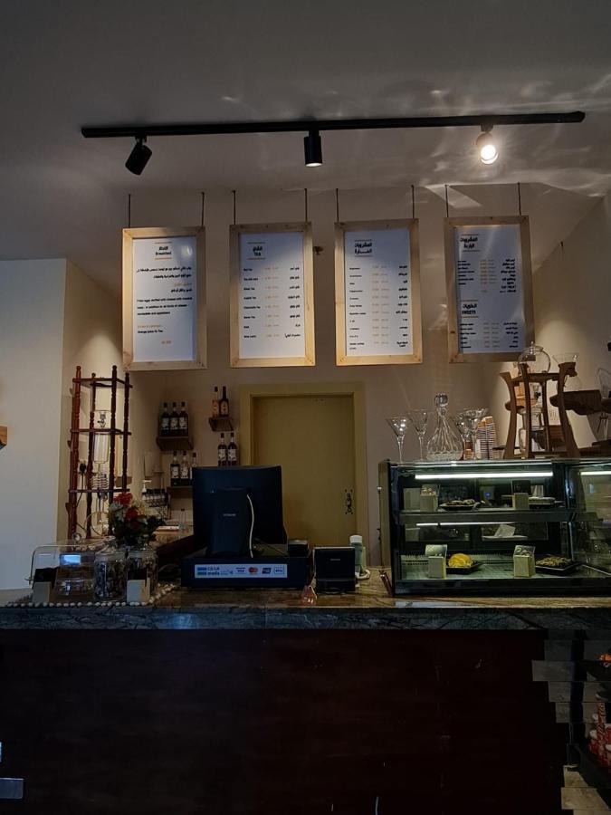 Aparthotel Taramuntan Ha'il Exterior foto Menu at a coffee shop