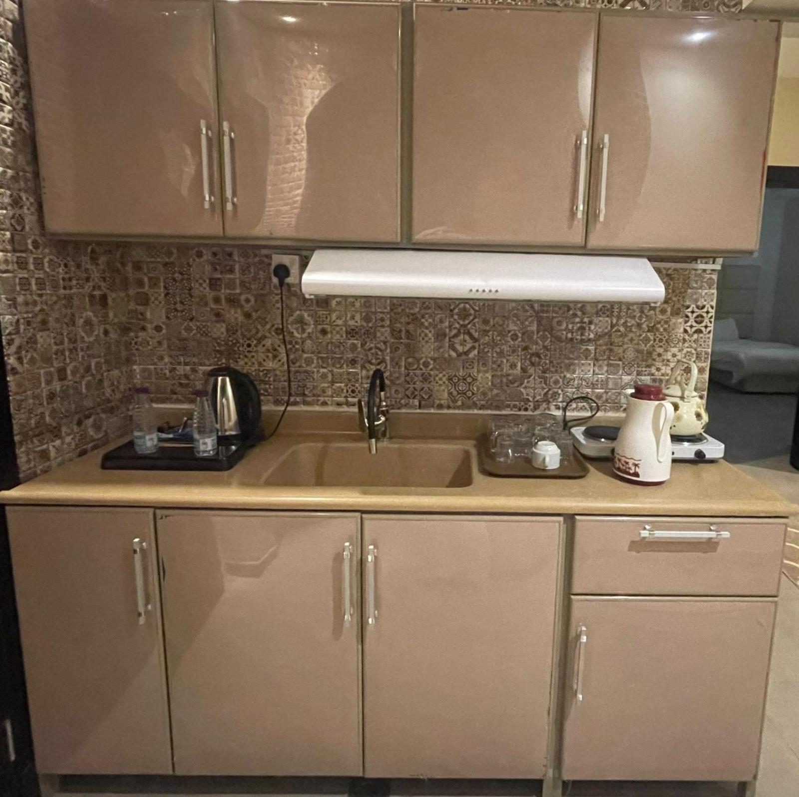 Aparthotel Taramuntan Ha'il Exterior foto A typical kitchen in a hotel