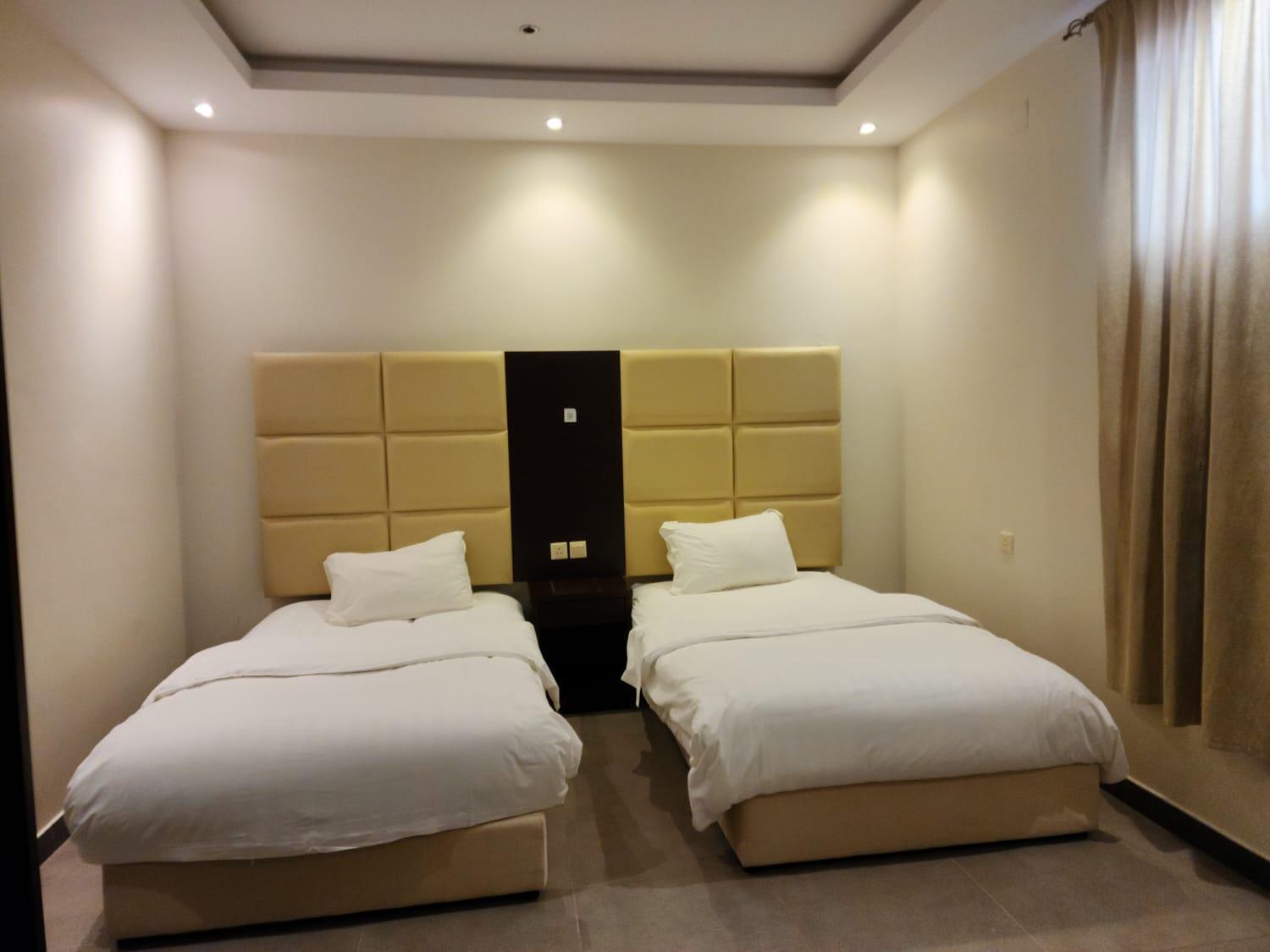 Aparthotel Taramuntan Ha'il Exterior foto A room at the hotel