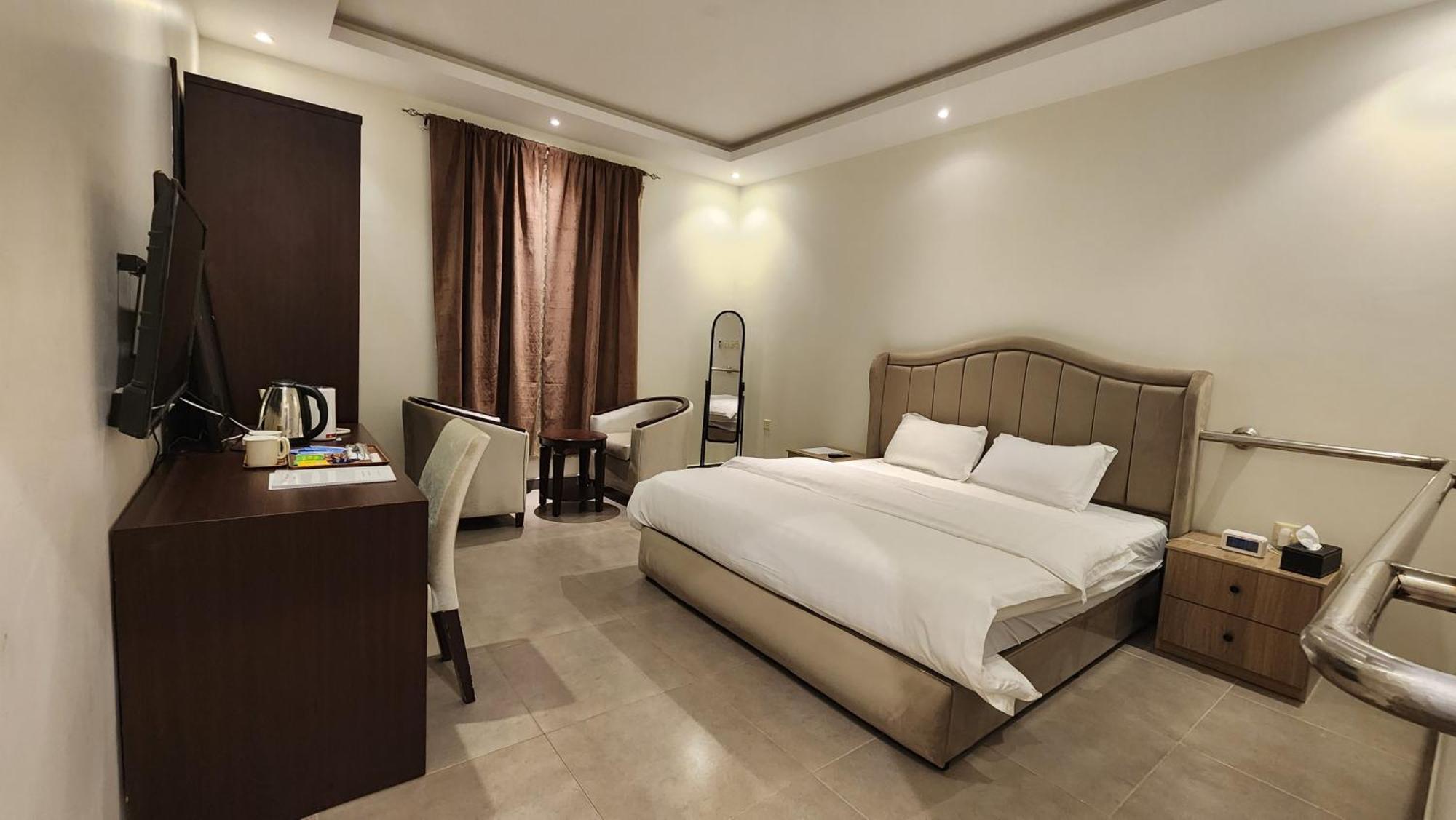 Aparthotel Taramuntan Ha'il Exterior foto A bedroom